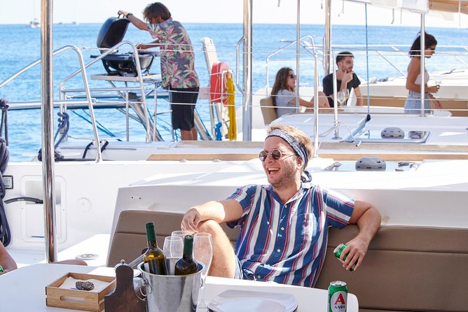 Santorini Platinum Catamaran Cruise with Meal, BBQ and Open Bar - Sunset, music, and the return ride