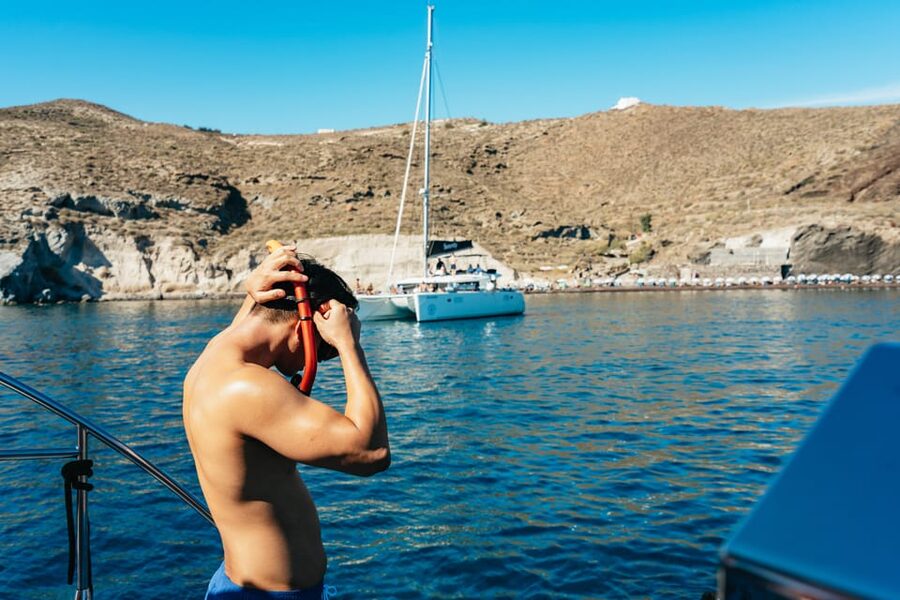 Santorini: Sailing Catamaran Cruise with BBQ and Drinks - Hot springs at Palea Kameni