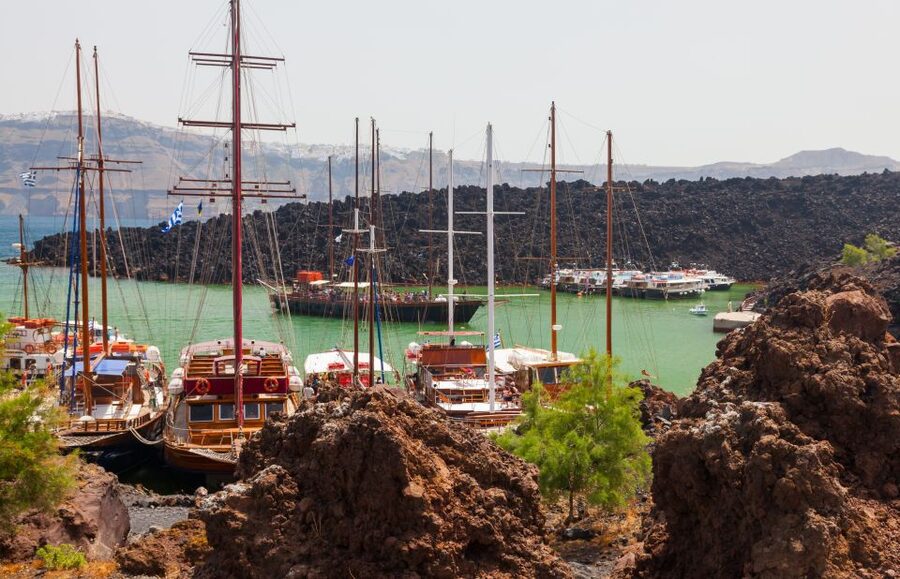 Santorini: Thirassia Islands and Volcano Guided Cruise - Walking across the black lava of Nea Kameni