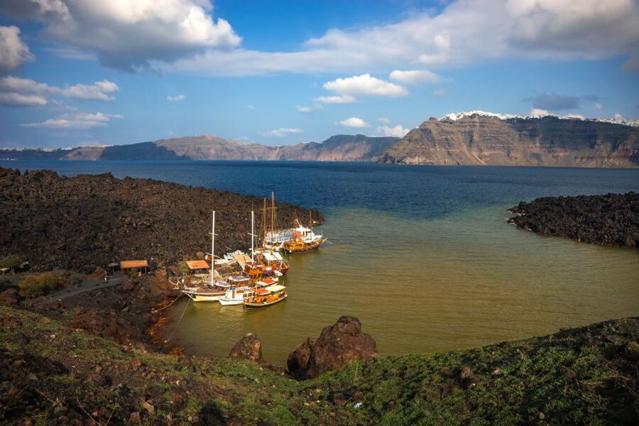 Santorini: Thirassia Islands and Volcano Guided Cruise - Returning past Oia from the water