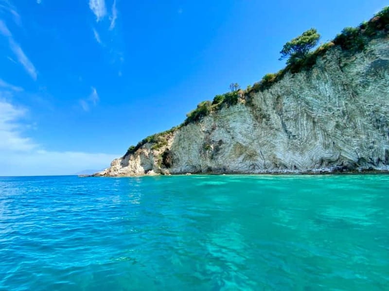 Sarandë: Ionian Coast Hidden Beaches and Caves Boat Tour - Gjiri i Kakomes offers another clear-water stop