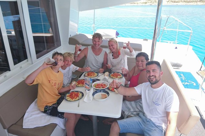 Shared Catamaran All inclusive-Day Cruise to Naxos or Paros - Weather, cancellations, and practical limits