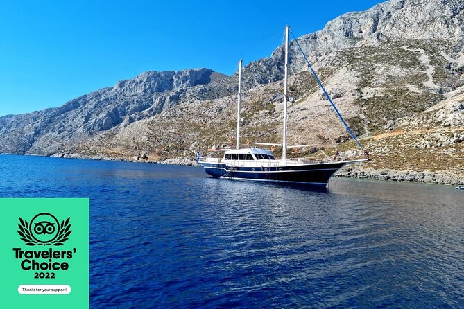 Shared Mykonos Sail Cruise to Delos and Rhenia Islands - Rhenia: Clear Water, Snorkeling, and a Long Lunch