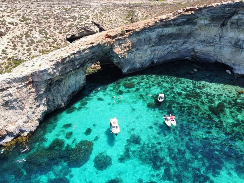 Sliema: Cruise to Comino, Crystal Lagoon, and Blue Lagoon - Crystal Lagoon and St. Nicholas Bay from the boat