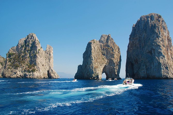Small Group Boat Tour Capri & Blue Grotto with Swimming Stops - Lunch, drinks, and the limoncello finish