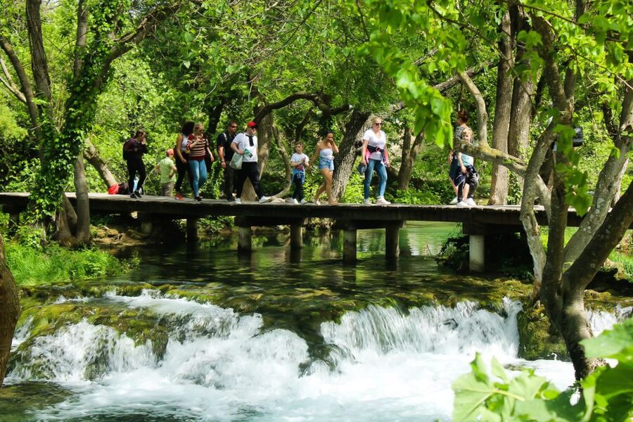 Split: Krka Waterfalls With Boat Cruise, Wine and Olive Oil - The wooden paths around Skradinski buk