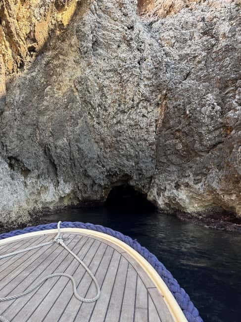 Split/Podstrana: Blue Cave, Hvar & 6 Islands Speedboat Trip - Komiža gives the day its local character
