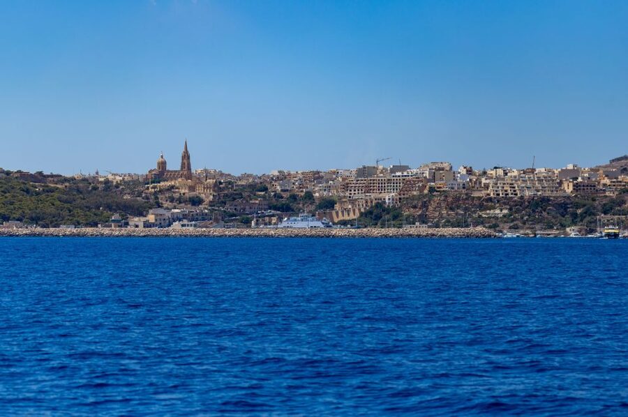 St. Paul's Bay: Gozo, Comino & St. Paul's Bus & Boat Tour - Caves and the route back toward St. Pauls Island