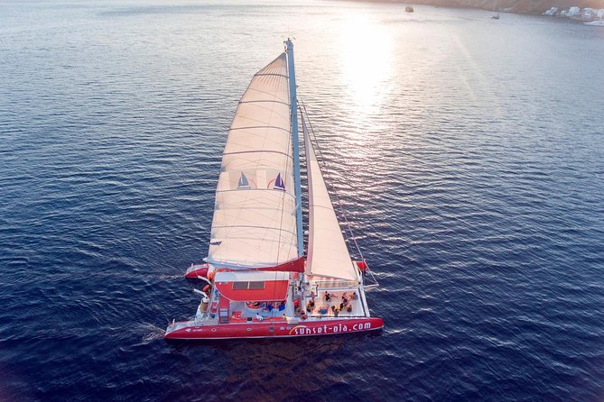 Sunset Sailing Catamaran Cruise in Santorini with BBQ and Drinks - The sunset: beautiful, but timing matters