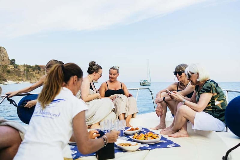 Taormina: Sunset Boat Tour with Dolphin Watching & Aperitif - Searching for bottlenose dolphins