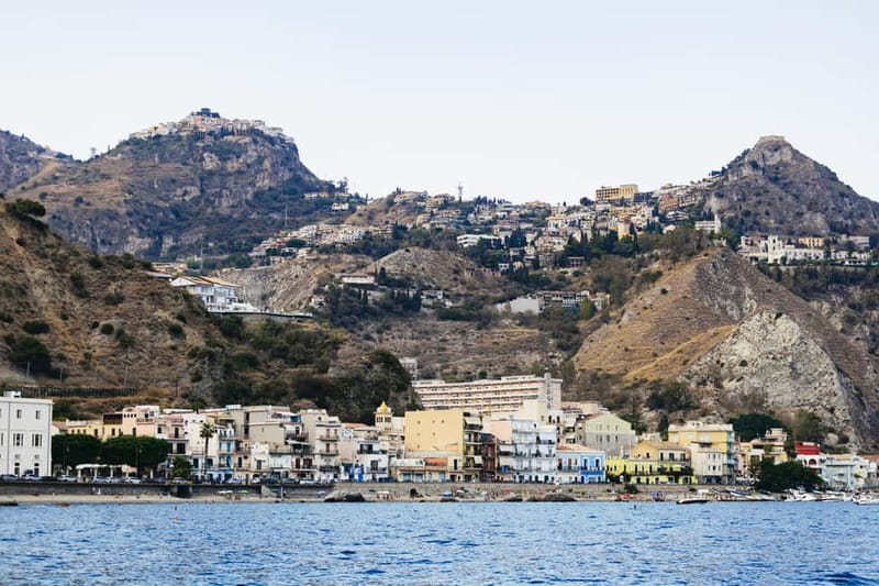 Taormina: Sunset Boat Tour with Dolphin Watching & Aperitif - What the crew adds to the experience