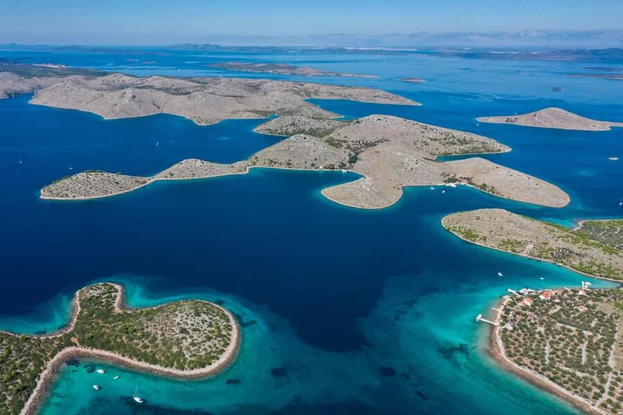 Zadar: Kornati and Telašćica Cruise with Ticket Included - Dolphins, music, and the ride home
