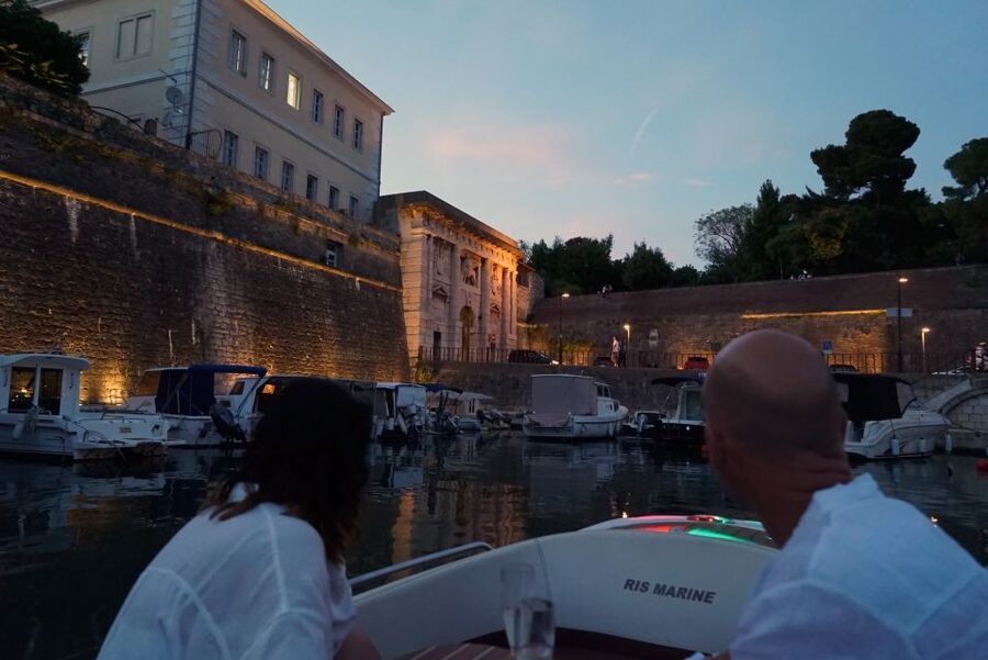Zadar: Sunset and Night Cruise with Unlimited Sparkling Wine - Zadar Bridge and Jazine Bay after dark