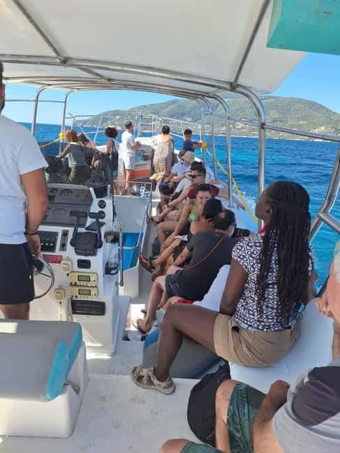 Zakynthos: Turtle Spotting, Marathonísi & Keri Caves Cruise - Finding the yellow boat at Agios Sostis Port